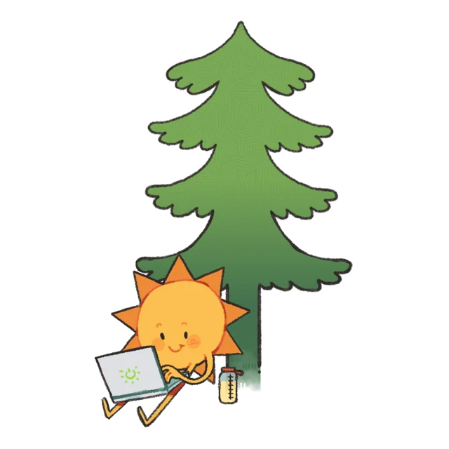 The sun mascot coding beneath a pine tree.